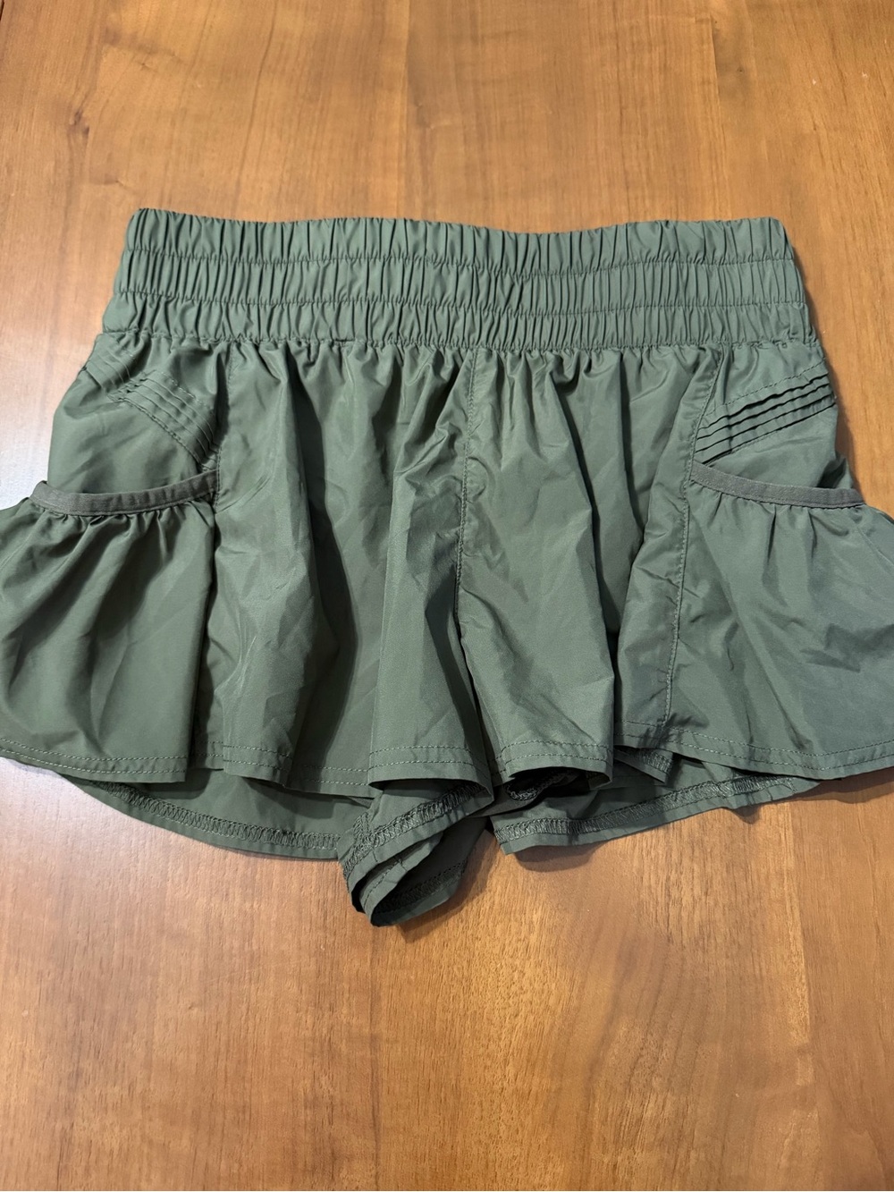 Free People get your flirt on Olive Green Ruffle Athletic Shorts